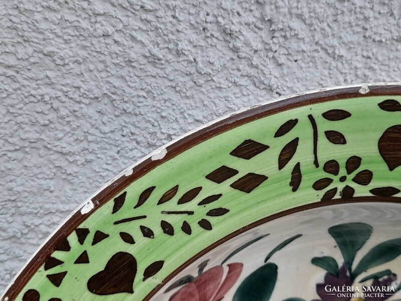 Antique Hungarian folk wall bowl with flowers