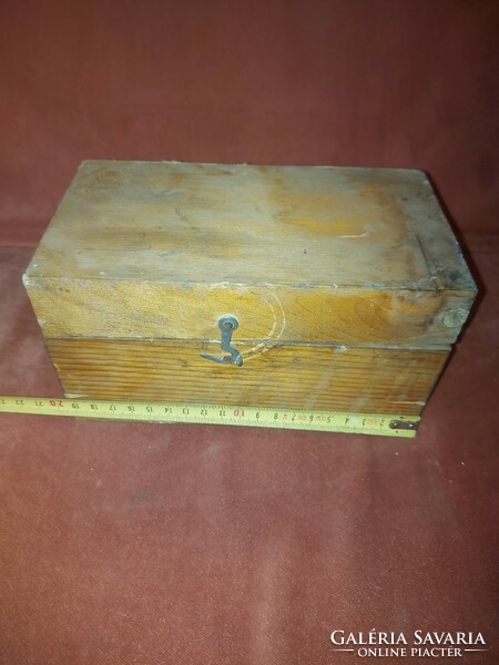 Balance weights in a wooden box
