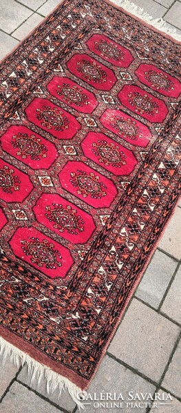 Hand-knotted Bokhara rug. Negotiable.