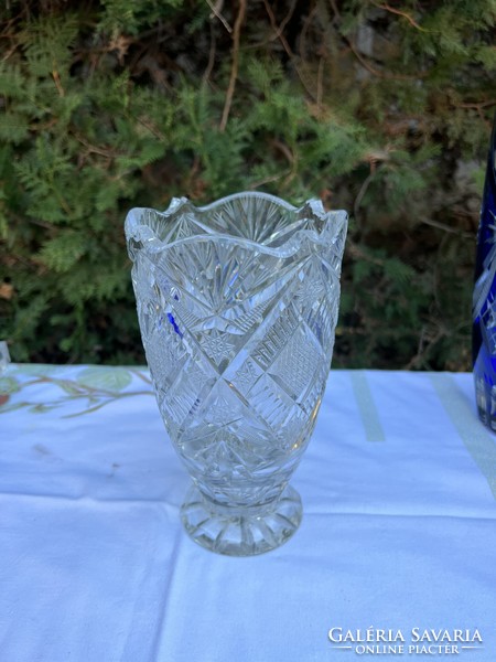 Crystal glasses, vases, table decorations are sold together
