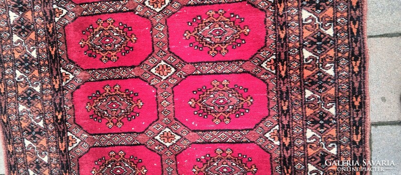 Hand-knotted Bokhara rug. Negotiable.