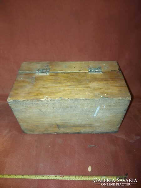 Balance weights in a wooden box