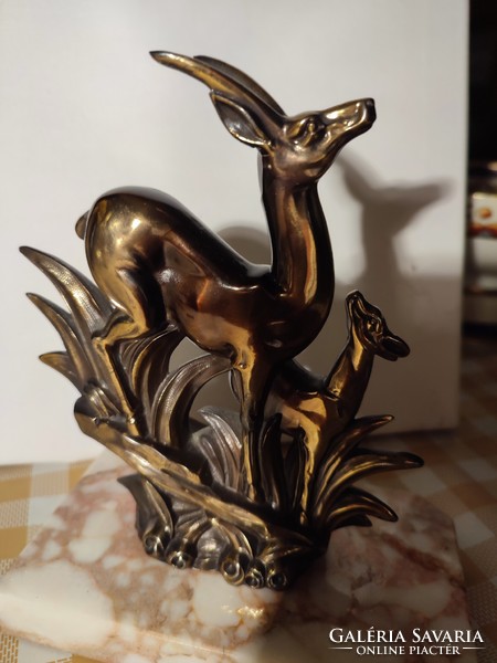 Bronze bookend on a marble base