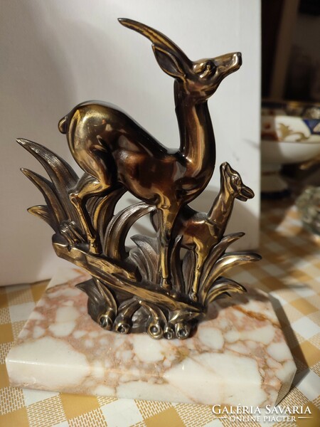 Bronze bookend on a marble base