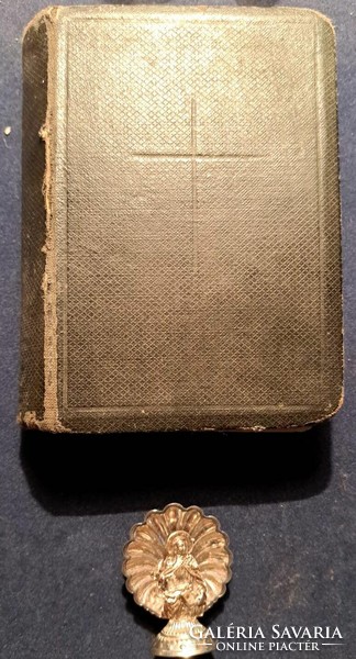 Antique prayer book and gilded prayer object in one.