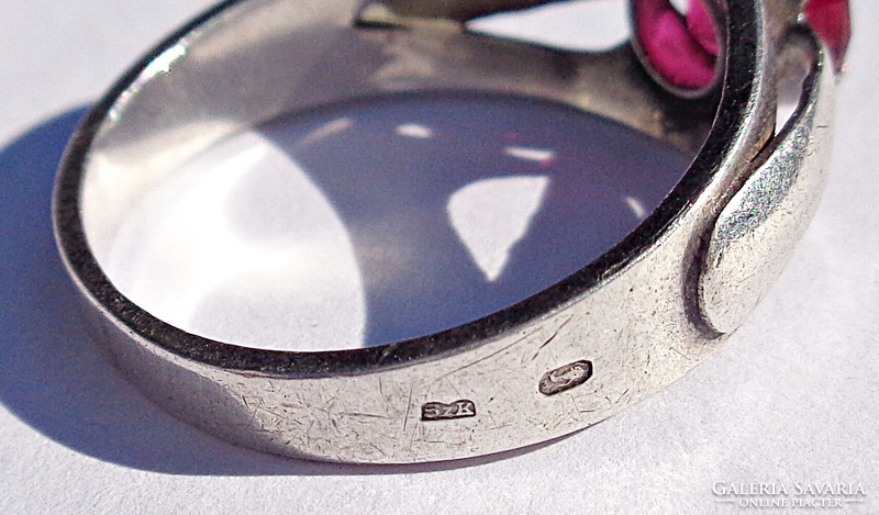 Silver ring with red stones