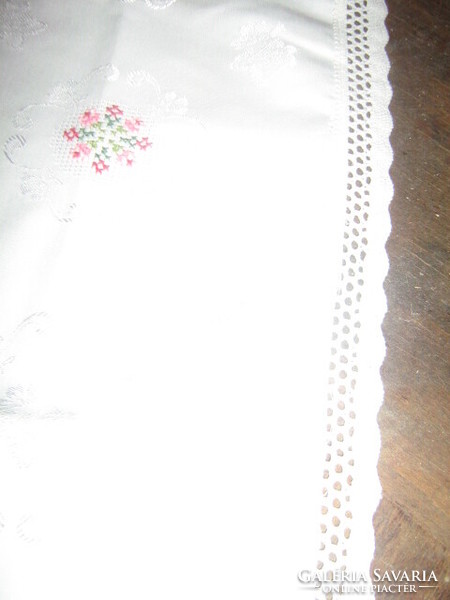 Beautiful damask tablecloth with white lace edge hand-embroidered tiny cross-stitch flowers