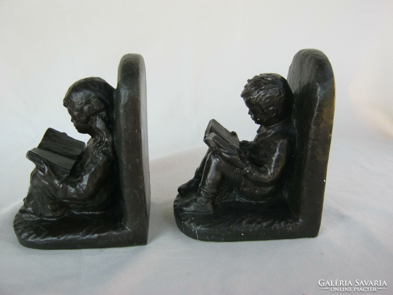 Bookend couple reading girl and boy