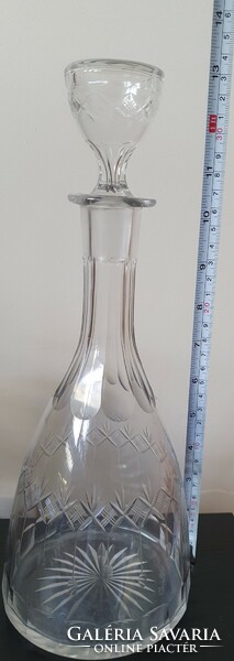 Old antique glass bottle with glass stopper for liquor