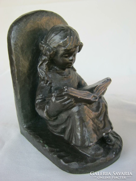 Bookend couple reading girl and boy