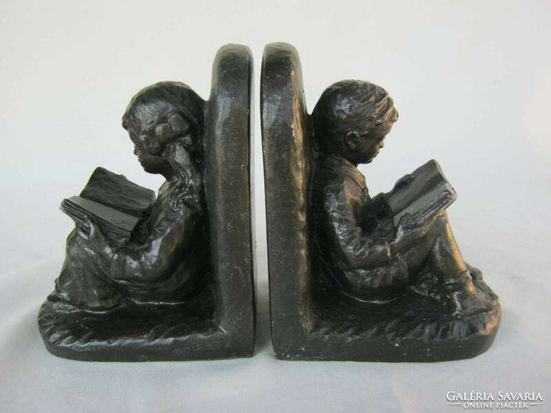 Bookend couple reading girl and boy