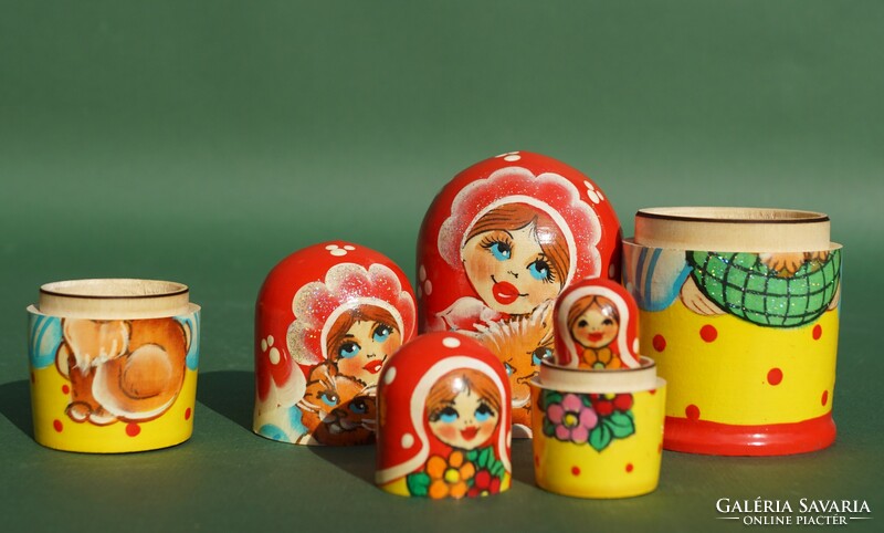 Old rare painted 5-piece Russian matryoshka doll girl with a cat