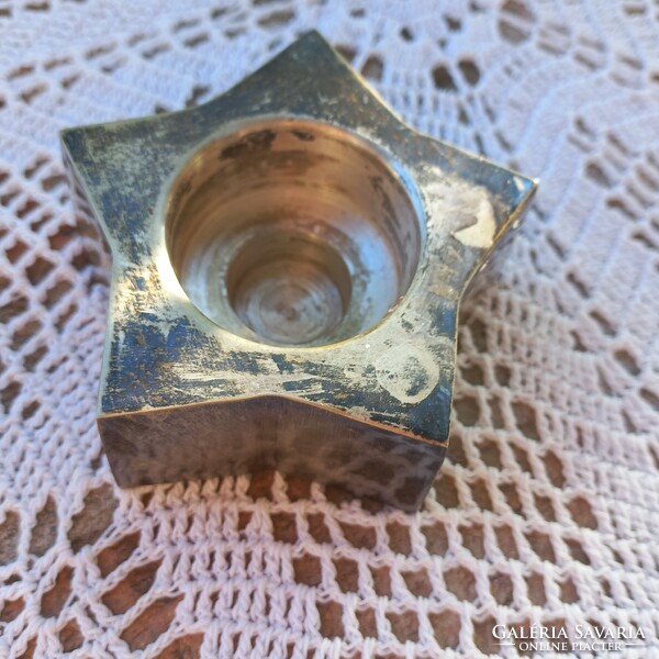 Star-shaped silver-plated candle holder