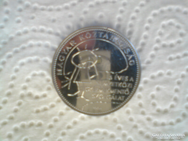 HUF 50 coin celebrates 15 years of the international child rescue service 2005