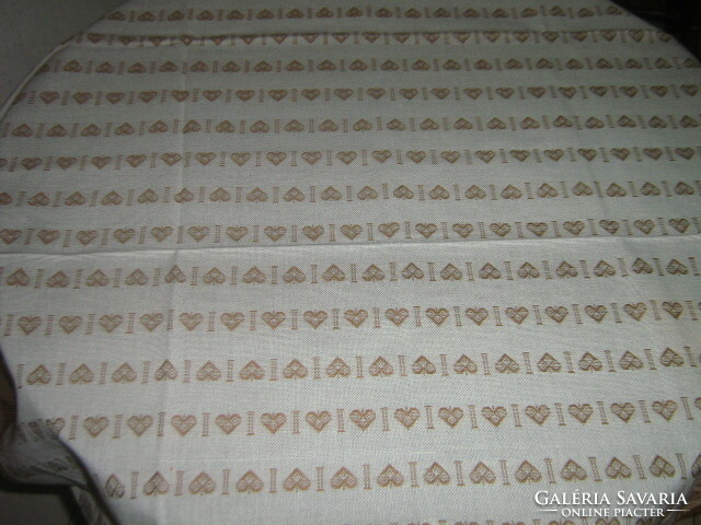 Wonderful heart-shaped white-brown lacy-edged woven tablecloth