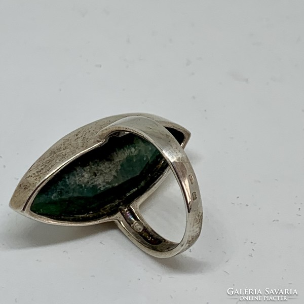 Silver ring with emerald stones