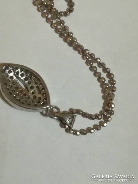 Silver / 925 / necklace with pendant decorated with rhinestones.