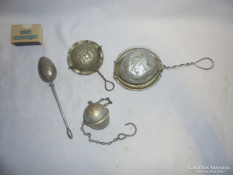 Four old, retro tea filters, tea eggs - together