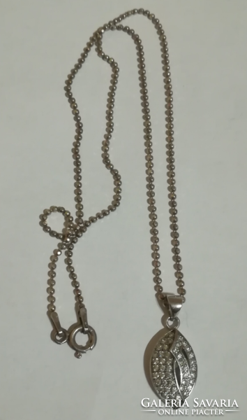 Silver / 925 / necklace with pendant decorated with rhinestones.