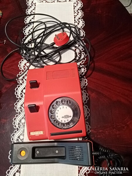 Retro red vinyl telephone device with original long cord