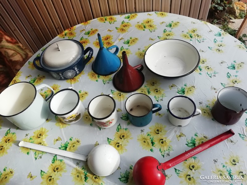 Old enamel kitchen utensils in the condition shown in the pictures