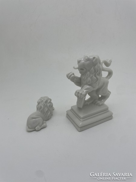 Two German antique nymphenburg porcelain lions 9cm 3cm