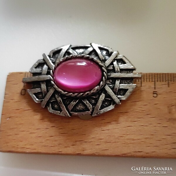 Celtic pattern metal badge with mineral stone
