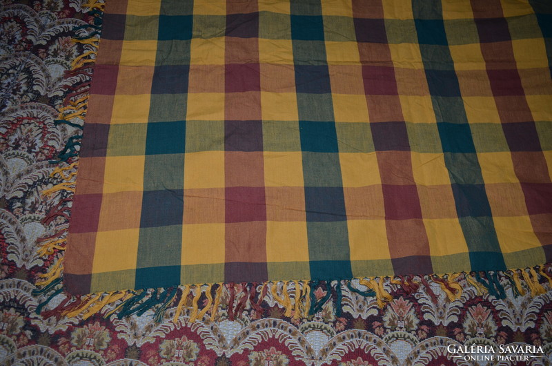A checkered tablecloth with a large woven pattern - bedspread