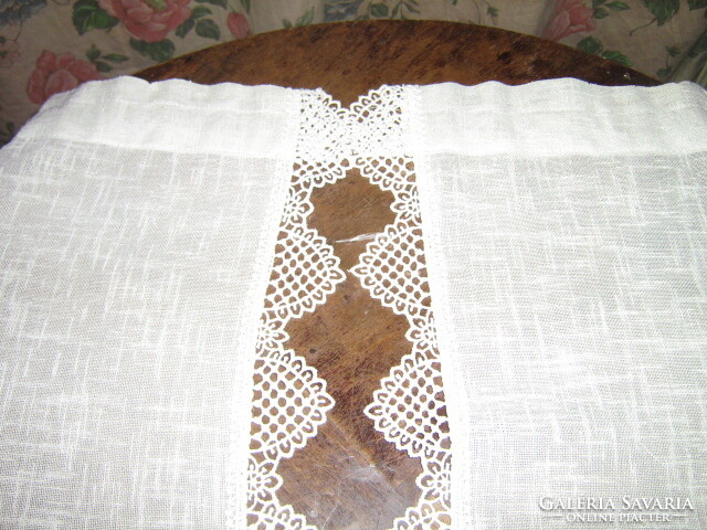 A beautiful pair of vintage-style stained glass curtains with a special lace edge