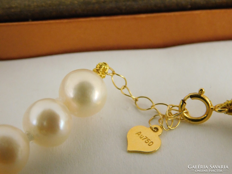 Pearl bracelet 18k gold with adjustable chain clasp