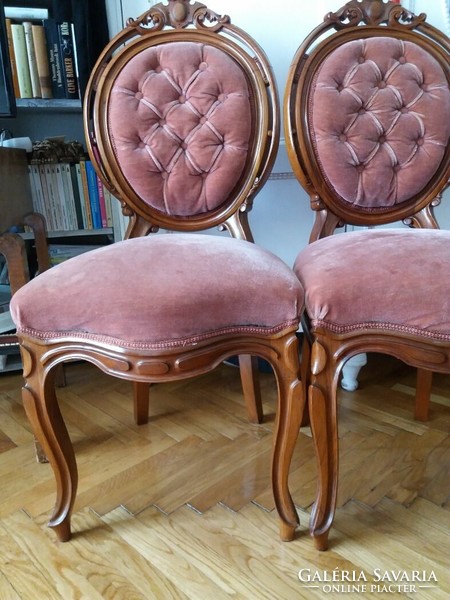 Pair of upholstered wooden chairs