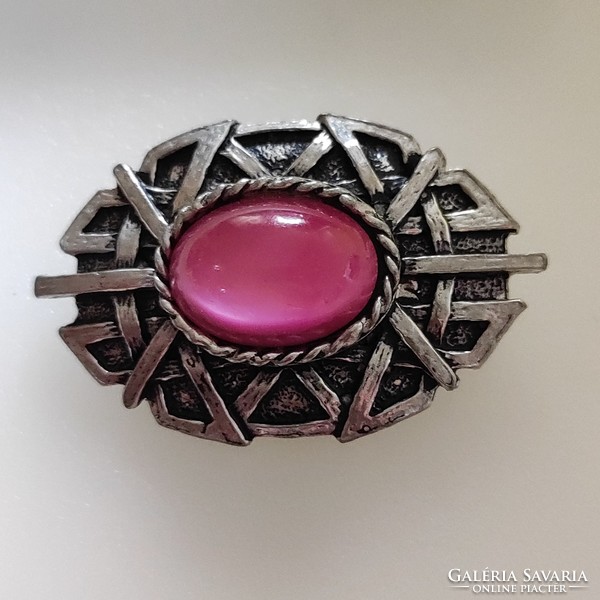 Celtic pattern metal badge with mineral stone