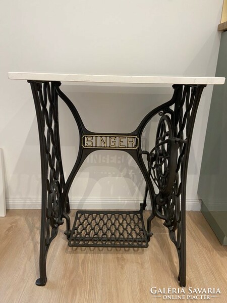 Singer refurbished sewing machine table with white marble top