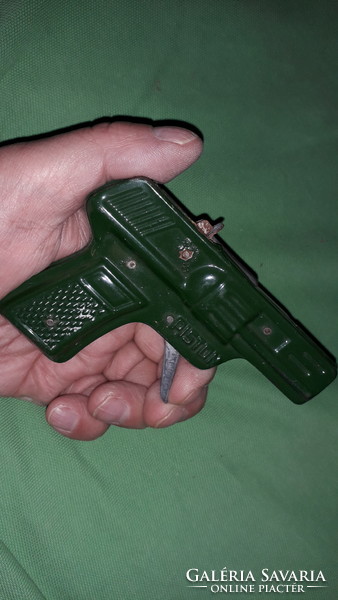 1940s metal plate toy ribbon cartridge pistol, revolver as shown in the pictures