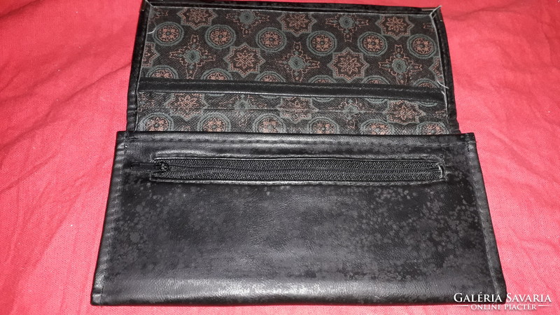 Old black leather waiter's wallet 