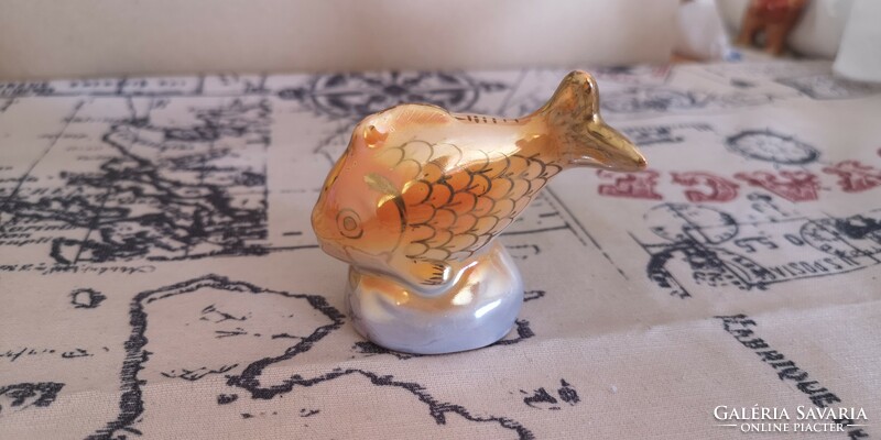 Industrial artist Goldfish figure