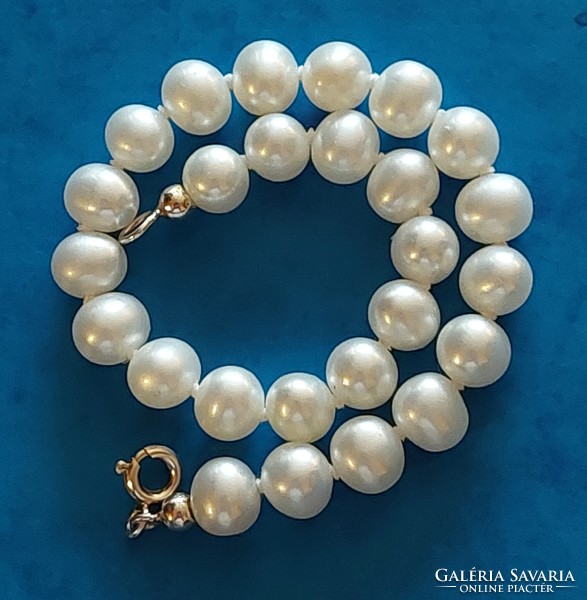 Very nice genuine cultured pearl bracelet with knotted cord