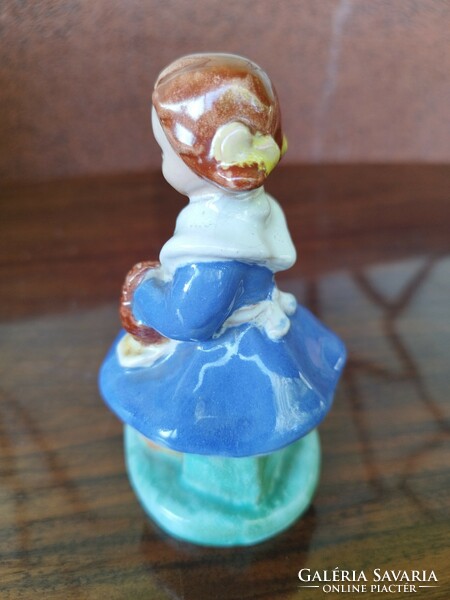 Ceramic little girl with a basket