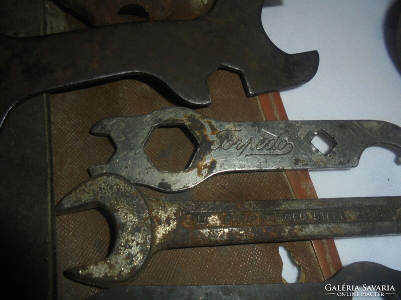 Old bicycle parts: tool bag, tools, oilers, bells, ...- Together