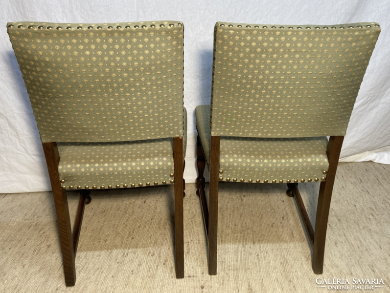 2 carved upholstered chairs