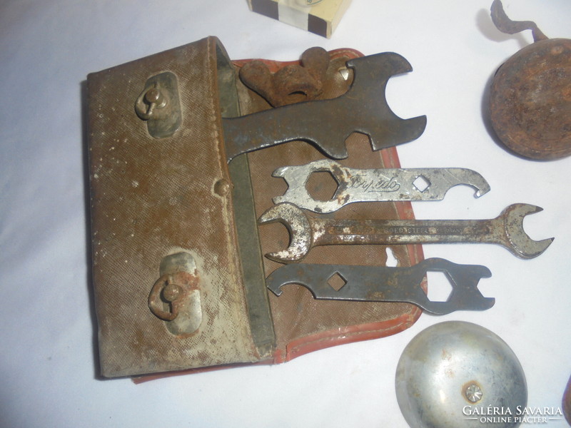 Old bicycle parts: tool bag, tools, oilers, bells, ...- Together