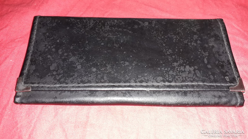 Old black leather waiter's wallet 