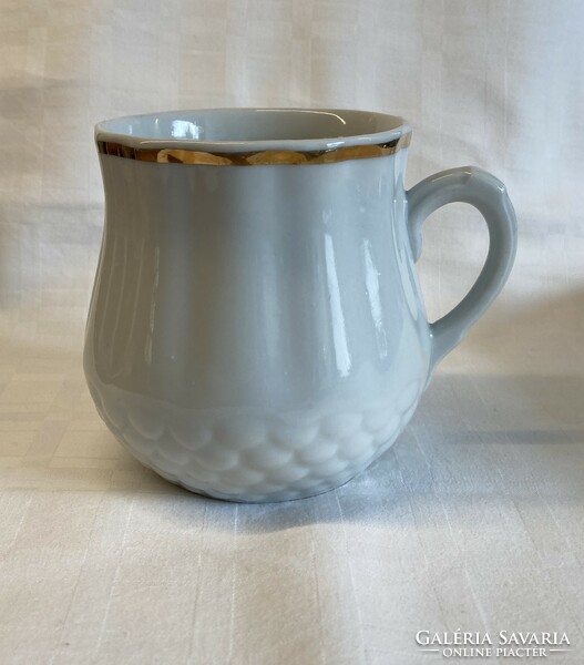 Zsolnay belly mug in display case