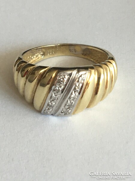 14k gold ring decorated with zirconia stones, 5.24 g