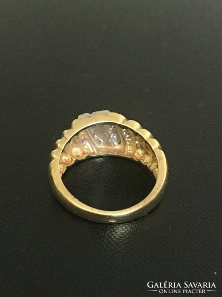 14k gold ring decorated with zirconia stones, 5.24 g