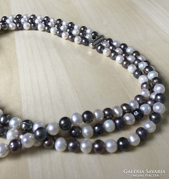 New, three-row cultured two-color string of pearls with a silver clasp