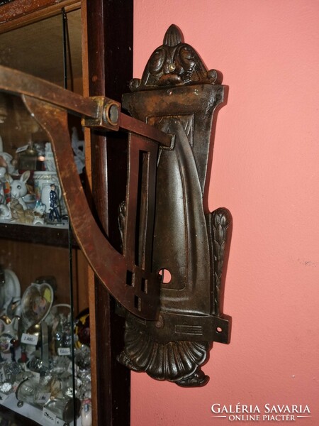 Old renovated Art Nouveau wall arm with glass rod