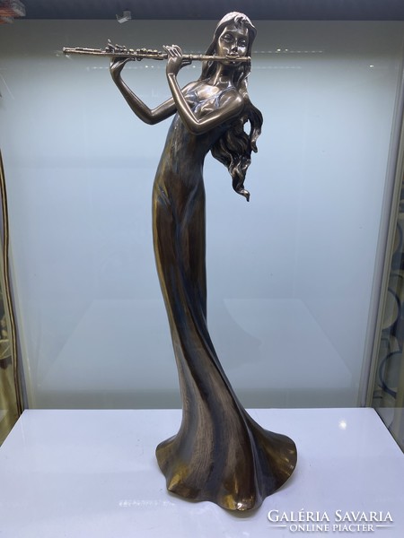 Flute girl bronze statue