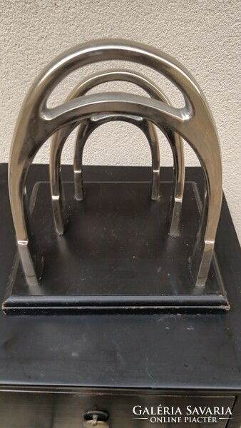 Modern design nickel magazine newspaper holder horseshoe shape.