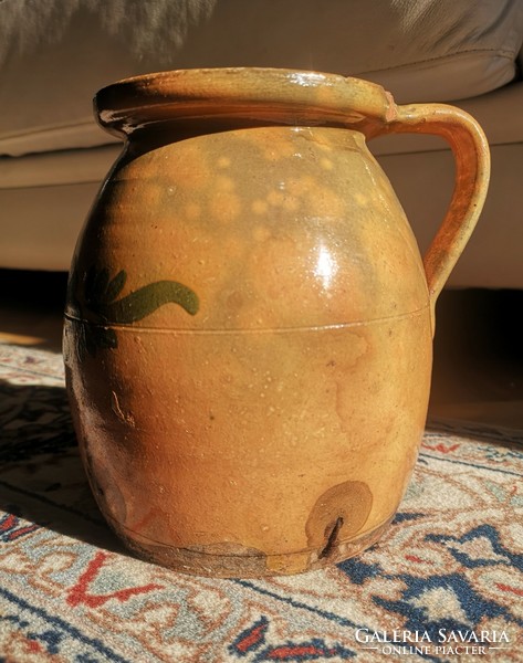 Glazed silk with blue flowers, old, damaged clay bowl